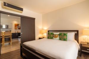 Letto o letti in una camera di Roble Sabana 404 Luxury Apartment Adults Only - Reserva Conchal