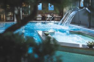 Bazén v ubytování Portaria Hotel nebo v jeho okolí