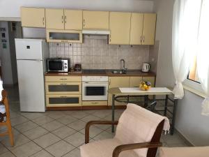 Kuchyň nebo kuchyňský kout v ubytování Apartment Katarina