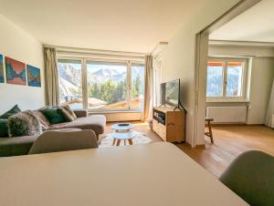 TV a/nebo společenská místnost v ubytování Viktoria A39 by Arosa Holiday