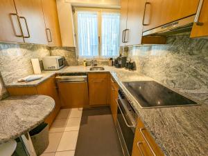Kuchyň nebo kuchyňský kout v ubytování Viktoria A39 by Arosa Holiday