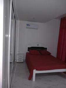 Ένα ή περισσότερα κρεβάτια σε δωμάτιο στο Edifício 2PALMA