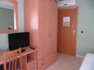 TV a/nebo společenská místnost v ubytování Hostal Meseguer