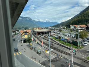 a view from a window of a city with a street at HOTEL CHRISTINA in Wilderswil