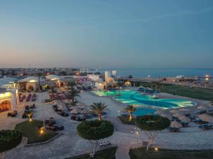an aerial view of a resort with a pool at Mercure Hurghada Hotel in Hurghada