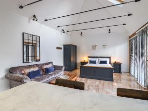 Ένα ή περισσότερα κρεβάτια σε δωμάτιο στο Dreamwood Lodge