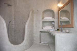 Um banheiro em Fanari Vista Suites