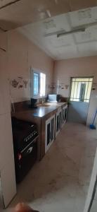 a kitchen with a sink and a stove at MediSweet Apartments Meublés in Yaoundé