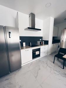Η κουζίνα ή μικρή κουζίνα στο Apartamento KENOA metropolitano