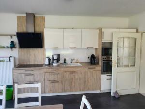 Η κουζίνα ή μικρή κουζίνα στο Ferienhaus Drees 5 Sterne