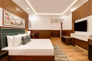 Letto o letti in una camera di Lemon Tree Hotel, Mcleodganj