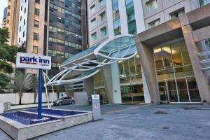 a large building with a ramp in front of it at King room - Brooklin flat in Sao Paulo