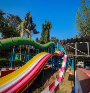 a group of slides at a playground at Visava Amusement Park & Resort Navi Mumbai in Navi Mumbai