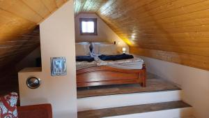 Postel nebo postele na pokoji v ubytování Újhegy Apartman