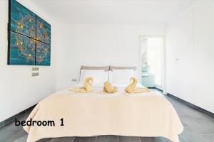 Een bed of bedden in een kamer bij Villa Collection Madroñal