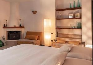 Postel nebo postele na pokoji v ubytování Casa 34 + 37 fotografií