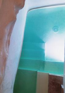 a view from the inside of a pool of water at Dimore di Gio' Luxury Private Wellness Spa in Ostuni