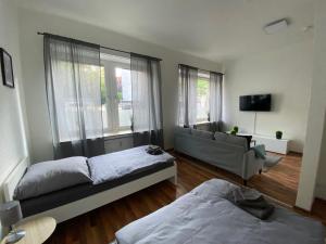 Katil atau katil-katil dalam bilik di Ruhrpott Apartment Zentral Garden