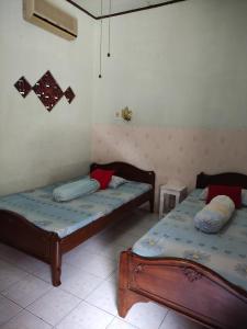 Letto o letti in una camera di Fortuna Guest House