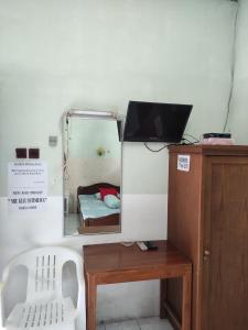 TV o dispositivi per l'intrattenimento presso Fortuna Guest House