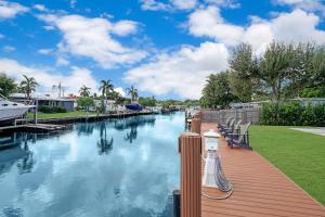 a view of a canal with a boat at Dania Beach Unit 1 By Pmi in Dania Beach