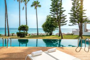 a swimming pool with a view of the ocean at Yalihan Aspendos in Alanya