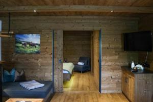 Televiisor ja/või meelelahutuskeskus majutusasutuses Chalet Heidi