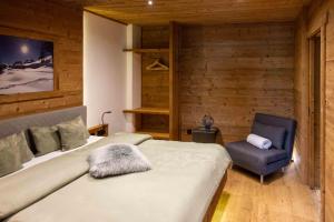 Voodi või voodid majutusasutuse Chalet Heidi toas