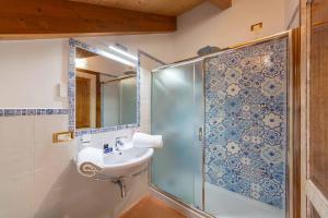 a bathroom with a shower and a sink at Villa Isabella Minori in Minori +32 photos