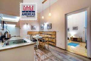 A kitchen or kitchenette at Little Americas Concert Hall Apartments