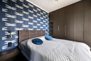 Postel nebo postele na pokoji v ubytování Apartament 601 Natural Baltic Darłówko