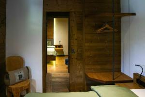 Voodi või voodid majutusasutuse Chalet Heidi toas