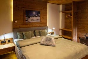 Voodi või voodid majutusasutuse Chalet Heidi toas
