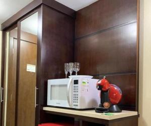 Kuchyň nebo kuchyňský kout v ubytování Hotel Paulista Plaza MCR