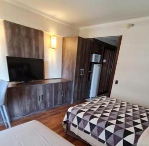Postel nebo postele na pokoji v ubytování Hotel Paulista Plaza MCR