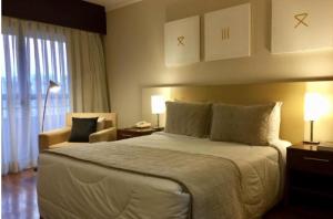 Postel nebo postele na pokoji v ubytování Hotel Paulista Plaza MCR