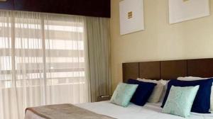 Postel nebo postele na pokoji v ubytování Hotel Paulista Plaza MCR