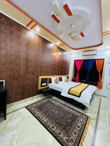 Ліжко або ліжка в номері The Amar Jaisalmer