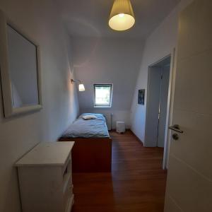Postel nebo postele na pokoji v ubytování FeWo in Ilsenburg Waldblick, schöne Aussicht