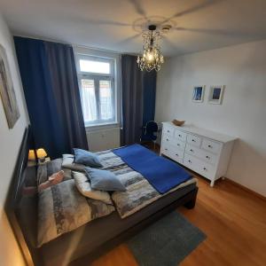 Postel nebo postele na pokoji v ubytování FeWo in Ilsenburg Waldblick, schöne Aussicht