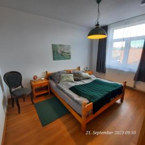 Postel nebo postele na pokoji v ubytování FeWo in Ilsenburg Waldblick, schöne Aussicht
