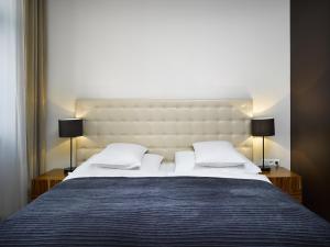 Posteľ alebo postele v izbe v ubytovaní The ICON Hotel & Lounge