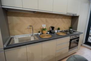 Cuisine ou kitchenette dans l'établissement Politehnica Park Retreat: Studio in New Building