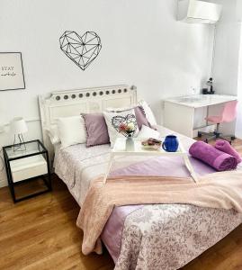 Posteľ alebo postele v izbe v ubytovaní Luna Centro 5 habitaciones
