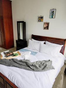 Posteľ alebo postele v izbe v ubytovaní Dwiputra Residence Presint 15 PutraJAYA