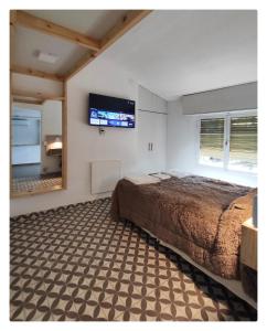 Ένα ή περισσότερα κρεβάτια σε δωμάτιο στο CASA TRANSFORMER