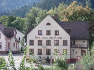a white building with a sign on it at Elegant Appartment in Freiburg im Breisgau