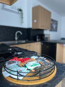 a pile of wires sitting on top of a stove at Flat 1 in Lampeter