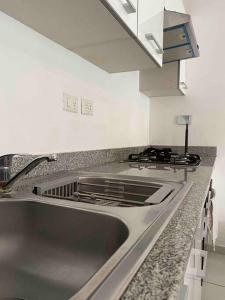 Η κουζίνα ή μικρή κουζίνα στο Estrella Dominicus con hermosa piscina! 1st floor