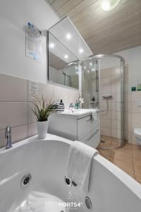 Koupelna v ubytování Ferienhaus Nordlicht Marina Wendtorf + 28 fotografií